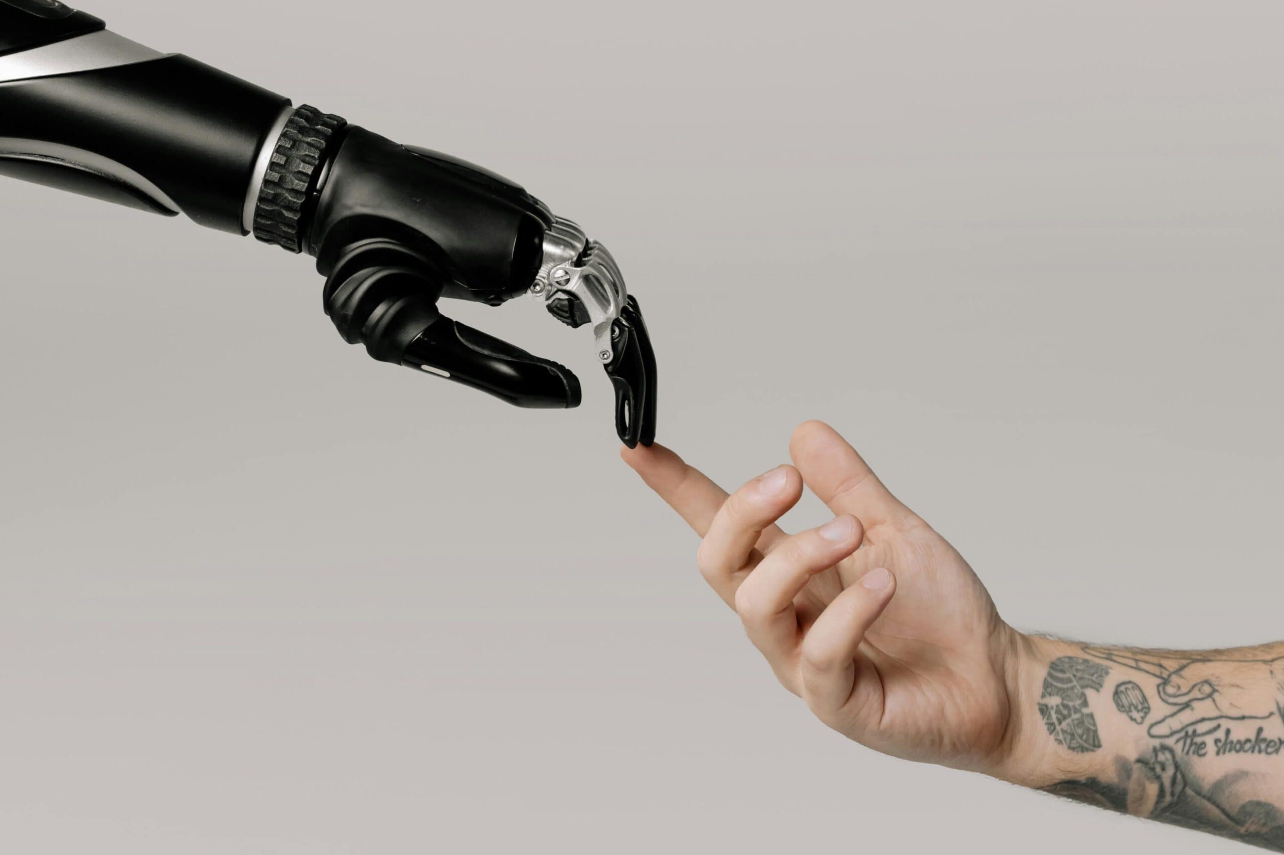 A robot and a human fingers touch
